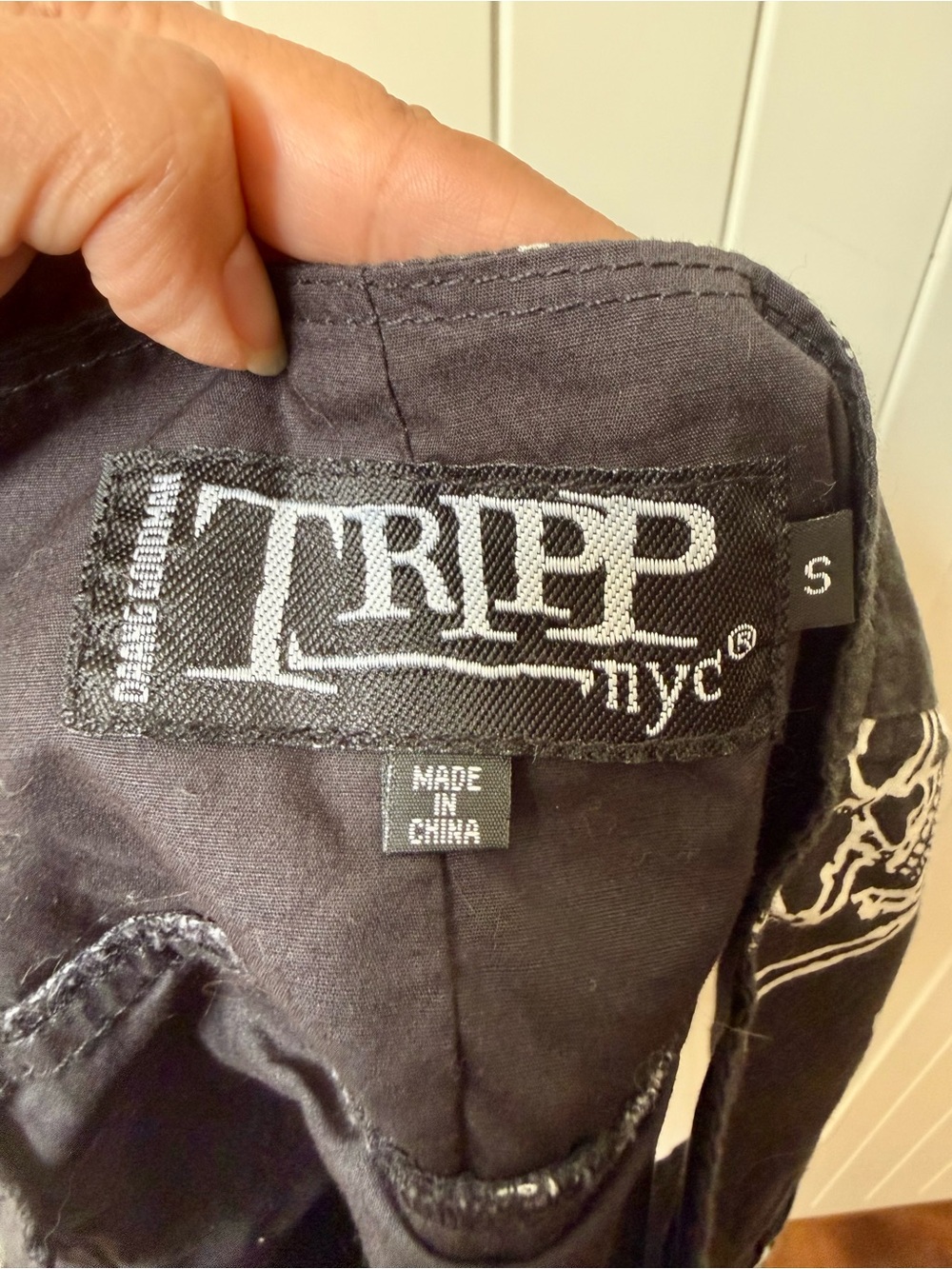 Tripp NYC Black Mini Skirt with White Skull Print - Picture 3 of 3